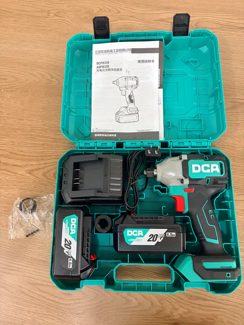 DCA ADPB520 photographed kit with two 4.0 Ah batteries, charger and case