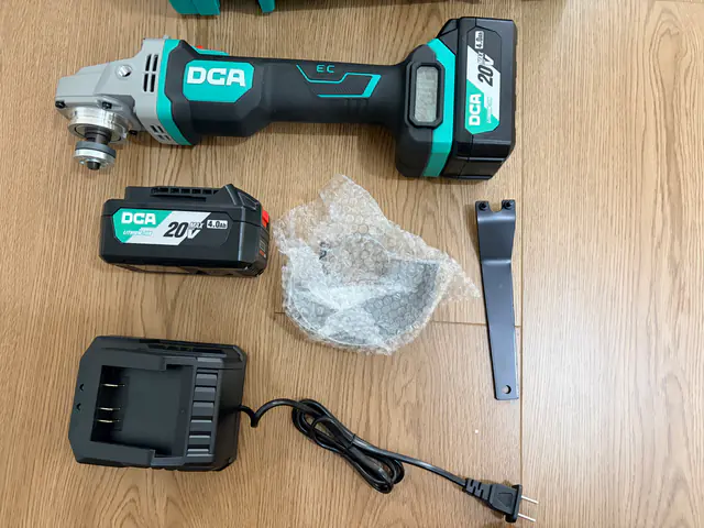 DCA ADSM06-100E 4.0 Ah kit contents laid out